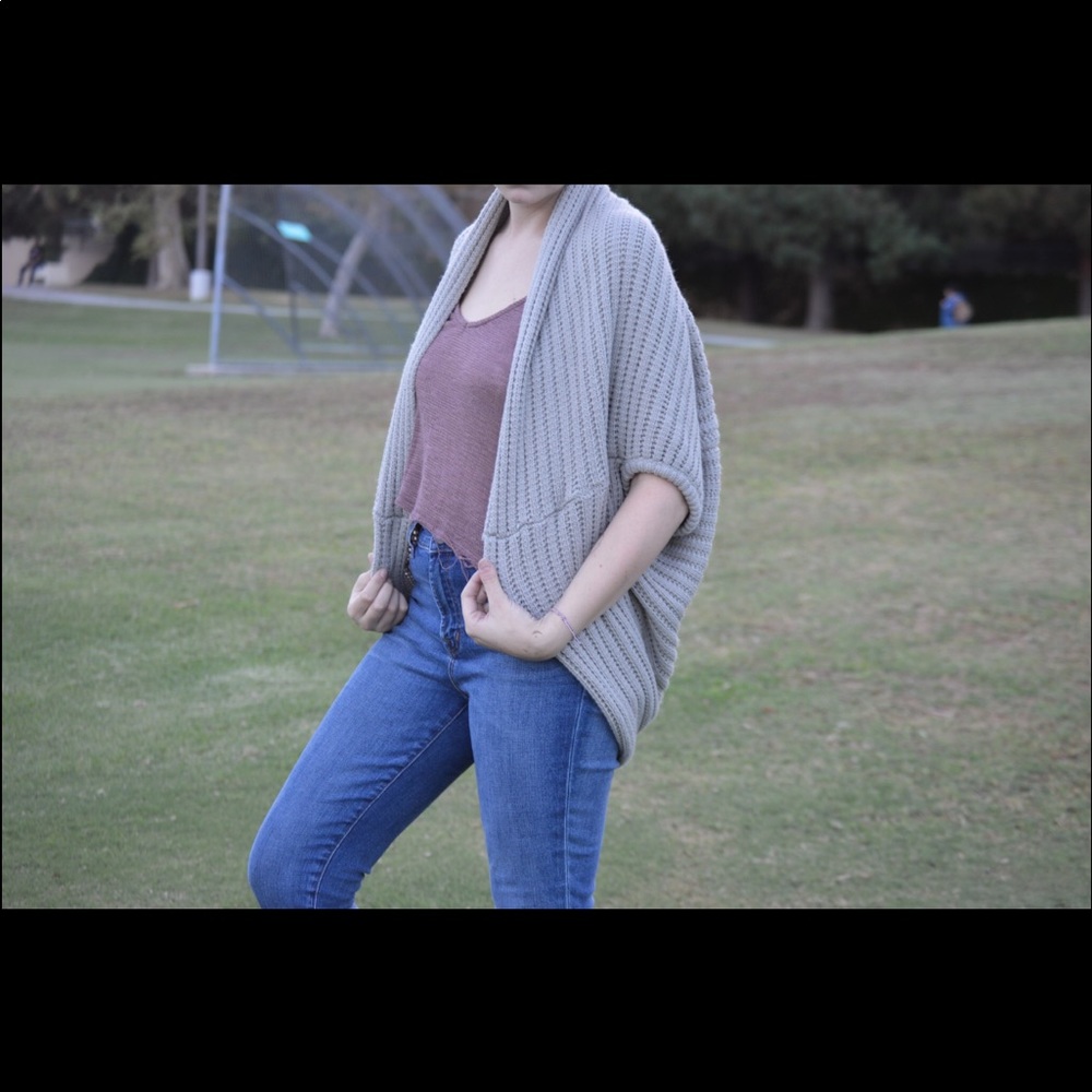 Knitted and uniquely wore Grey sweater
